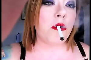 BBW Mistress Tina Snua Smoking A Filterless Cigarette In A PVC Top