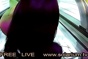Hot horny girl while masturbating on the solarium secretly filmed