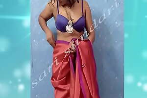 red sari without blouse skyblue color bra waring